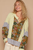 MQTIME  -  Exposed Seam Printed Notched Raglan Sleeve Knit Top