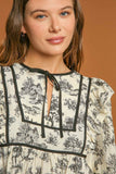 MQTIME  -  Umgee Ruffled Tie Neck Puff Sleeve Babydoll Blouse