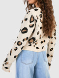 MQTIME  -  Tied Leopard Round Neck Cardigan