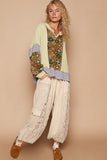 MQTIME  -  Exposed Seam Printed Notched Raglan Sleeve Knit Top