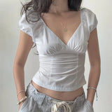 MQTIME  -  European and American style summer new women's clothing spicy girl low cut V-neck slim fit and slimming bubble sleeve shirt