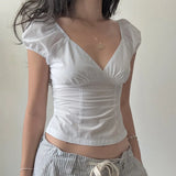 MQTIME  -  European and American style summer new women's clothing spicy girl low cut V-neck slim fit and slimming bubble sleeve shirt