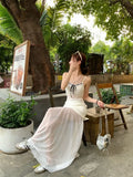  MQTIME  -  Bowknot-tied Lace Camisole with Net Yarn Patchwork and a Body-hugging Half Long Skirt