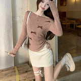 MQTIME  -  2025 Spring New Slant Collar Strapless Bow Patchwork Pleated Knit Long-sleeved T-shirt Women + Sexy Lace-up Skirt Two-piece Suit