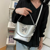 MQTIME  -  Spring/Summer 2024 new, solid color PU women's shoulder bag, silver bow decoration, fashion trend