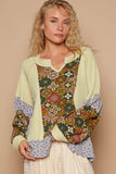 MQTIME  -  Exposed Seam Printed Notched Raglan Sleeve Knit Top